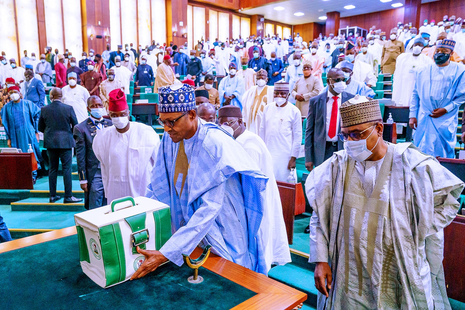 PHOTOS: Sen. Kalu In Social Distance Greetings With Buhari During 2021 Budget Presentation