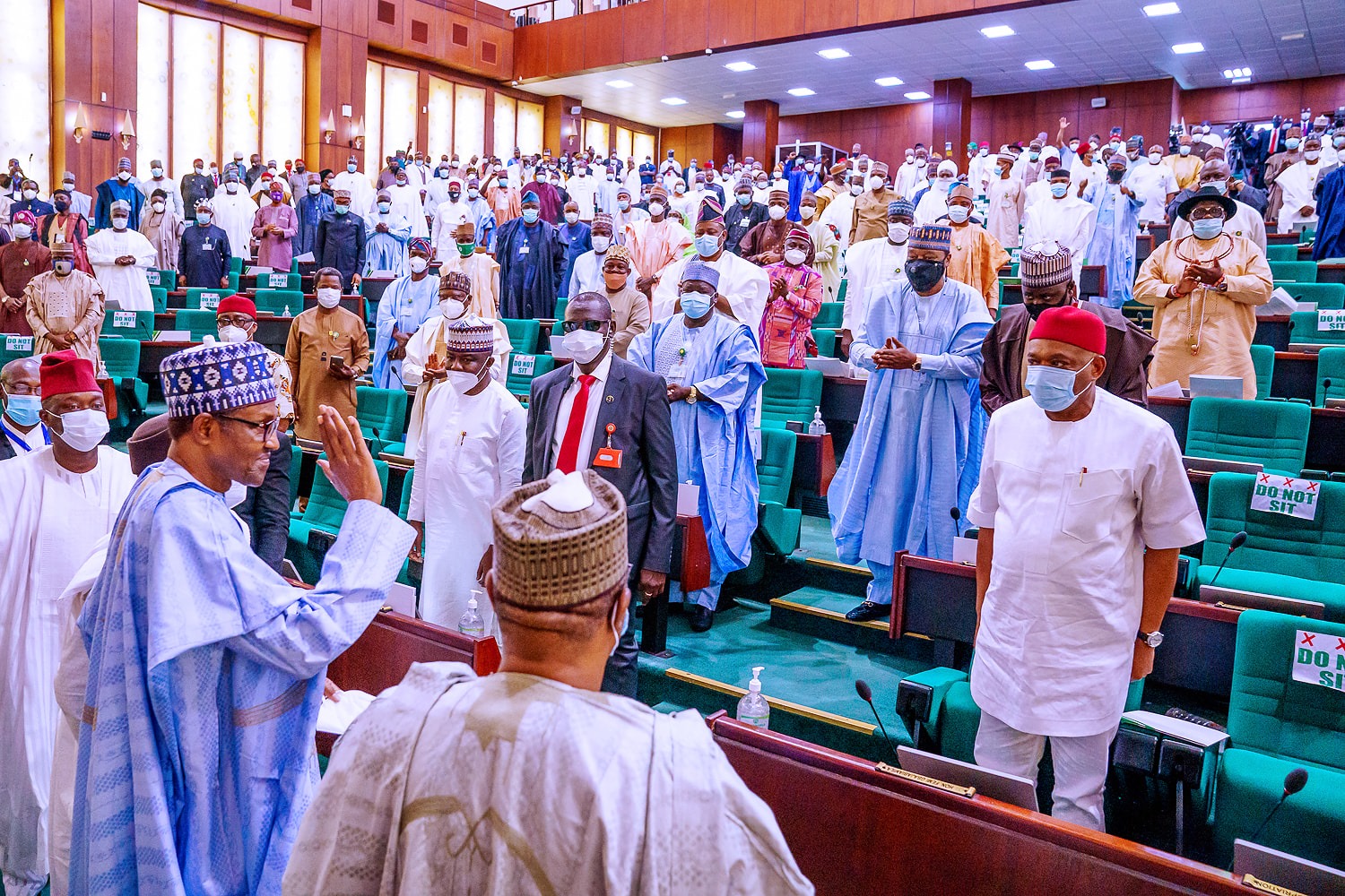 PHOTOS: Sen. Kalu In Social Distance Greetings With Buhari During 2021 Budget Presentation