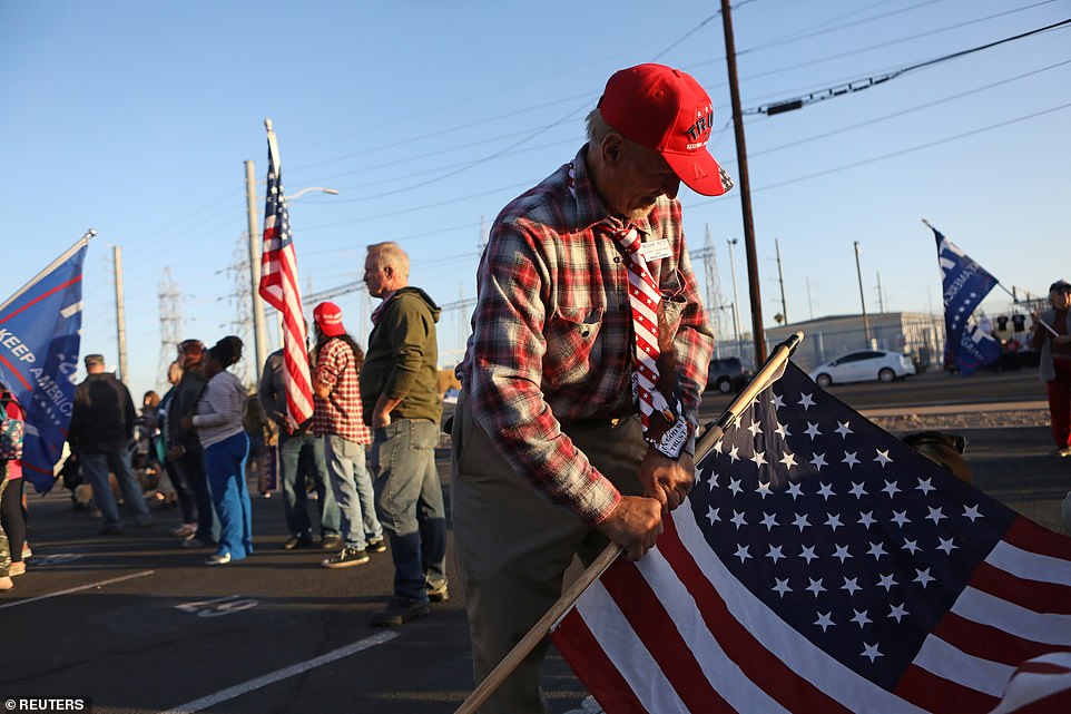 Trump Fans Holds Riffles Outside Election Centres2