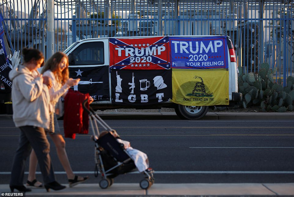 Trump Fans Holds Riffles Outside Election Centres3