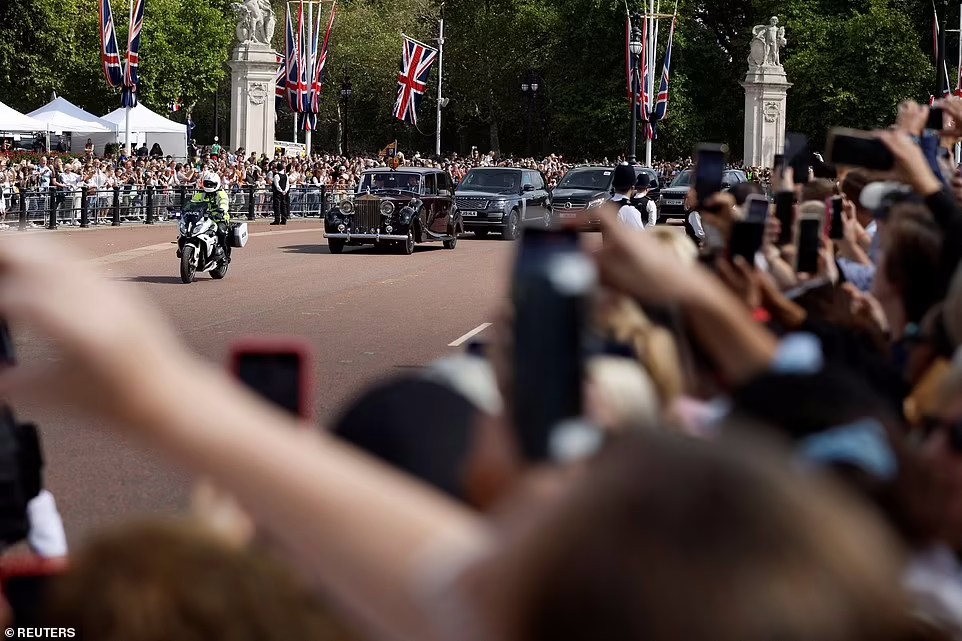 The monarch was accompanied by a motorcade of four cars and four police motorbikes