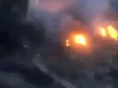 Hoodlums Set 15 Trucks Ablaze In Anambra Hoodlums Set 15 Trucks Ablaze In Anambra (VIDEO)