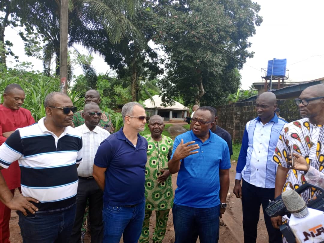 Rep Sam Onuigbo in company of Matthew Ifenkwe  (PG-OCWA), at the Km 17 of the road receiving explanation from Hashim Yassin, Project Engr, on when the water discharge work at that axis is scheduled to commence, April 11, 2023.