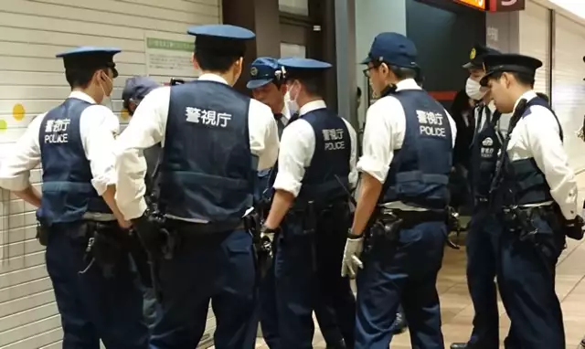 Police Arrest Man For Killing Four In Japan Gun Attack “Behind her came a man wearing camouflage and carrying a large knife, who stabbed her in the back,” the 72-year-old witness said. He said he called emergency services while neighbours tried to resuscitate the woman. The attacker announced: “I killed her because I wanted to,” according to an eyewitness cited by Kyodo news. Local media said he then fired what has been described as a hunting gun at police officers who arrived at the scene. The officers were inside a patrol car and the attacker placed the weapon against a window of the vehicle and fired twice, NHK reported. The slain officers were identified as Yoshiki Tamai, 46, and Takuo Ikeuchi, 61. Local media said the man then barricaded himself inside his father’s home, where he remained most of the night, with occasional gunshots heard. Two women, including the suspect’s mother, escaped the house, one at around 8:35 pm and the other soon after midnight. The suspect was finally detained. A woman was found at the scene with injuries and later pronounced dead. Japan was left reeling in July last year when former prime minister Shinzo Abe was shot dead in broad daylight with an apparently homemade gun. Abe’s accused assassin, Tetsuya Yamagami, reportedly targeted the politician over his links to the Unification Church. And last month, a man was arrested for allegedly hurling a pipe bomb-like explosive towards Prime Minister Fumio Kishida as he campaigned in the western city of Wakayama. Kishida was unharmed and a man arrested on the scene will undergo a three-month psychiatric examination, a regional court said this week. The suspect has reportedly remained tight-lipped about his motive for that failed attack.