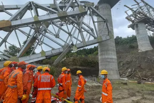India Bridge Collapse: At Least 26 Killed at Construction Site India Bridge Collapse: At Least 26 Killed at Construction Site