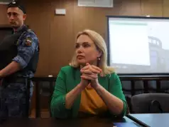 Russian Reporter Who Protested On TV Jailed In Absentia Russian Reporter Who Protested On TV Jailed In Absentia