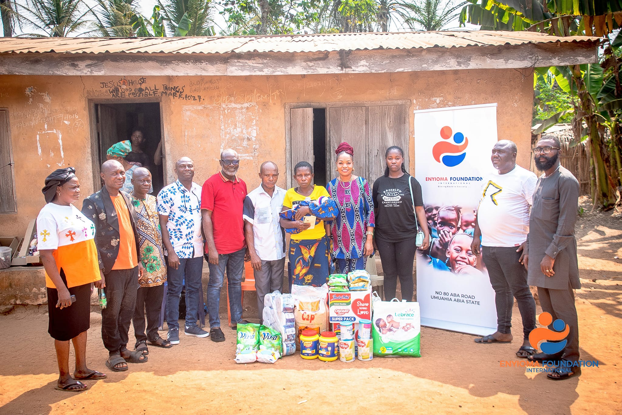 Enyioma Foundation INT’L Group Photo With Mr & Mrs Sunday Awa Mba Whose Daughter Died After Giving Birth To A Baby Girl