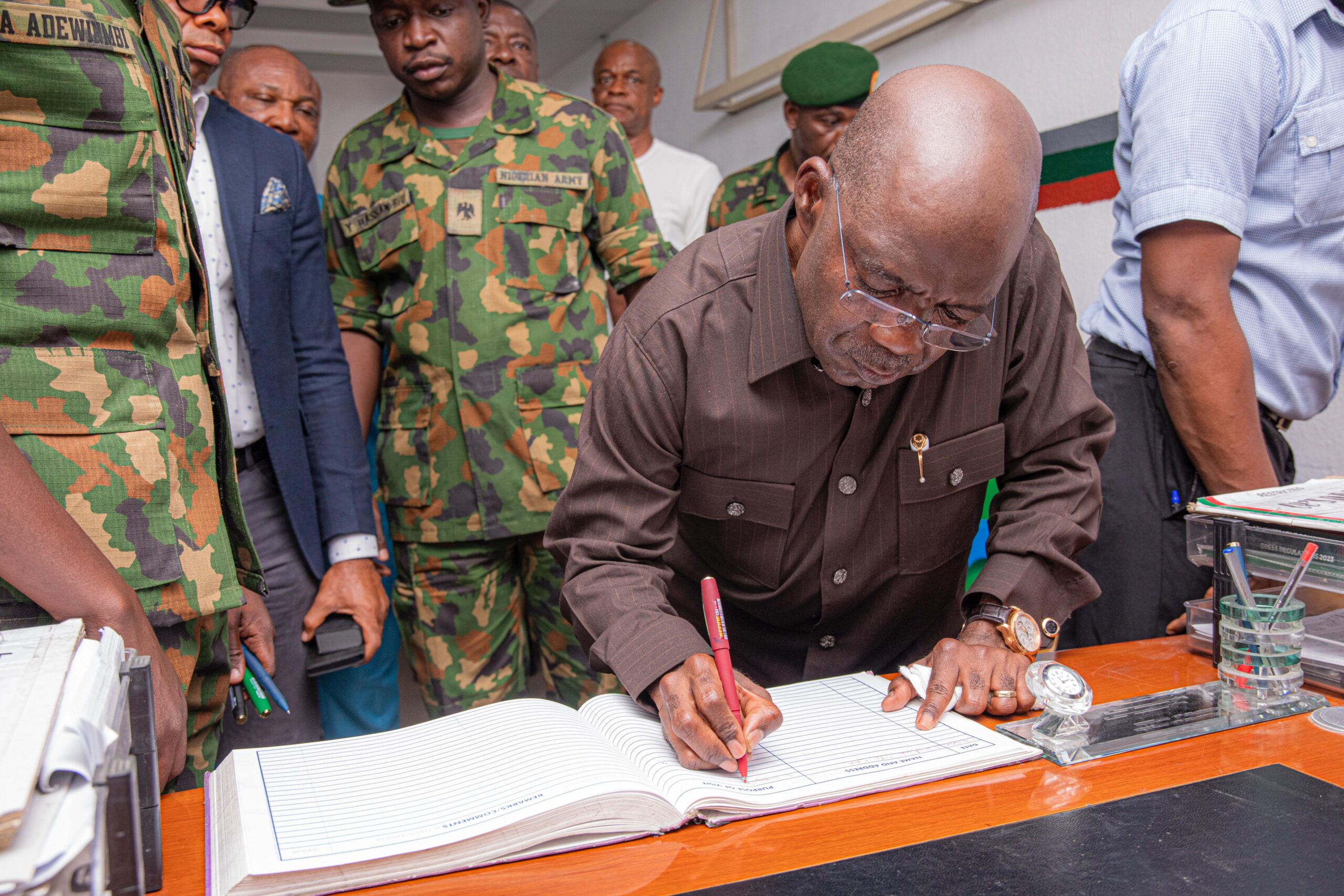 Abia State Governor, Dr. Alex Otti, OFR, signing the condolence register in honour of the five soldiers killed by yet-to-be-identified gunmen in Obikabia, Abia State, on Thursday, May 30, 2024. Governor Otti was at the 144 Battalion Asa, on Saturday to commiserate with the wives of the slain soldiers.