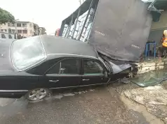 Truck Fails Brake Crushes Parked Mercedes Benz In Umuahia, No Casualties Reported (Photos, Video) Truck Crushes Parked Mercedes Benz In Umuahia, No Casualties Reported (Photos, Video)