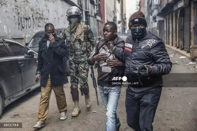 Kenya Police Fire Tear Gas At Protesters Kenya Police Fire Tear Gas At Protesters