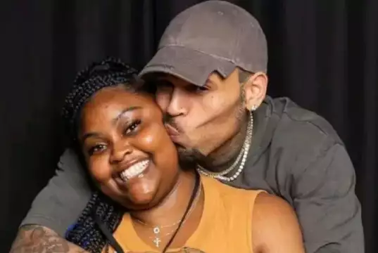 Zambian Man Vows To End Marriage With Wife Over Photo Of Chris Brown Kissing Her Cheek