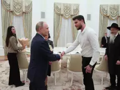 Putin Meets With Freed Russian-Israeli Hostage Putin Meets With Freed Russian-Israeli Hostages