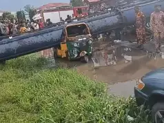Abia: Billboard Collapse Crushes Tricycles, Injures Passengers Abia: Billboard Collapse Crushes Tricycles, Injures Passengers