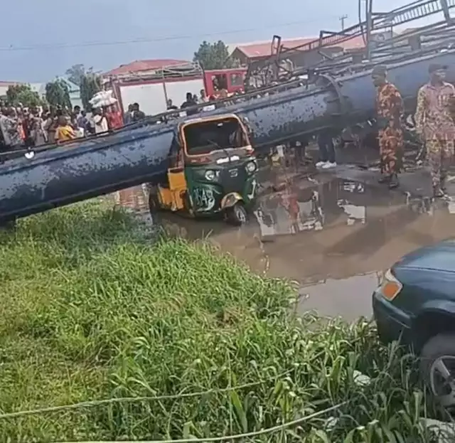 Abia: Billboard Collapse Crushes Tricycles, Injures Passengers Abia: Billboard Collapse Crushes Tricycles, Injures Passengers