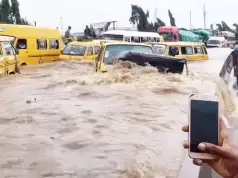 Residents, Motorists Battle Flash Floods As Heavy Rainfall Hits Lagos Heavy Rainfall Causes Flooding, Traffic Gridlock In Lagos