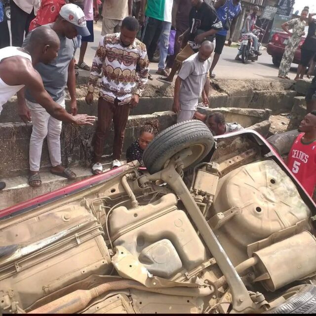 Woman Cheats Death As Car Somersaults Into Erosion Pit In Aba (Photos