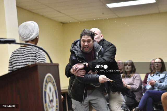 US Rep. Ilhan Omar Sprayed with Unknown Substance During Minneapolis Town Hall; Suspect Arrested US Rep. Ilhan Omar Sprayed with Unknown Substance During Minneapolis Town Hall; Suspect Arrested