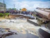 Commuters Stranded As Floods Cut Off Agbarho/Ughelli Road Commuters Stranded As Floods Cut Off Agbarho/Ughelli Road
